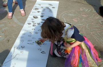 Image of a young girl printing on paper